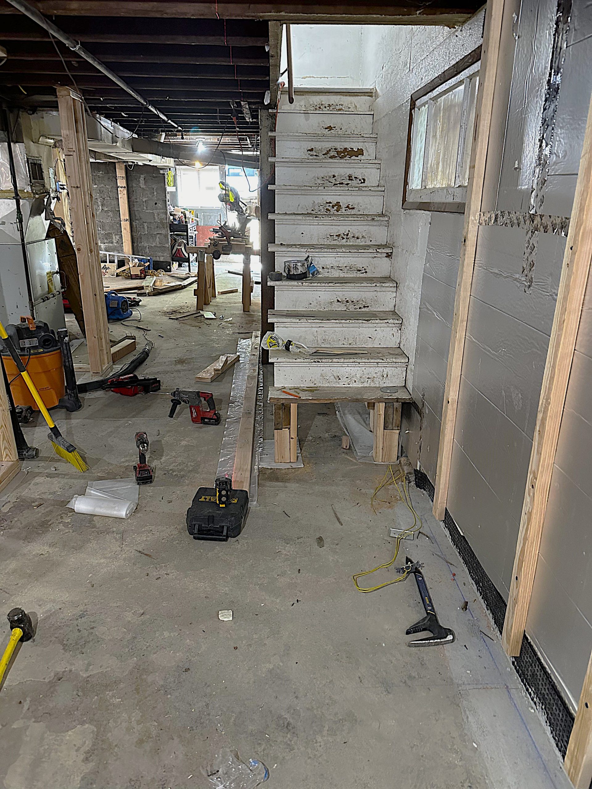 The original staircase leading to the basement was worn and not fitting for a modern basement conversion.