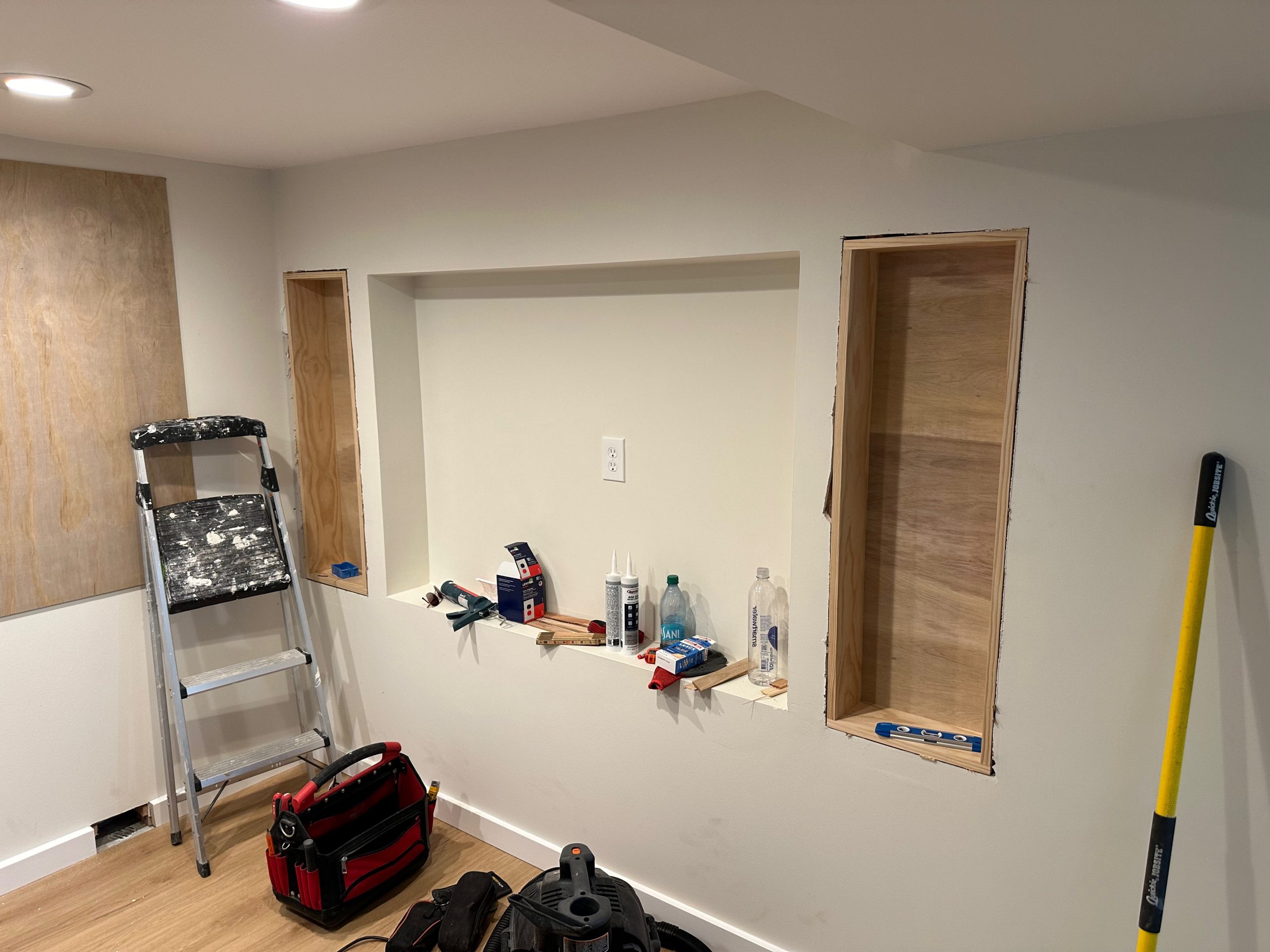 basement conversion process built in shelving scaled