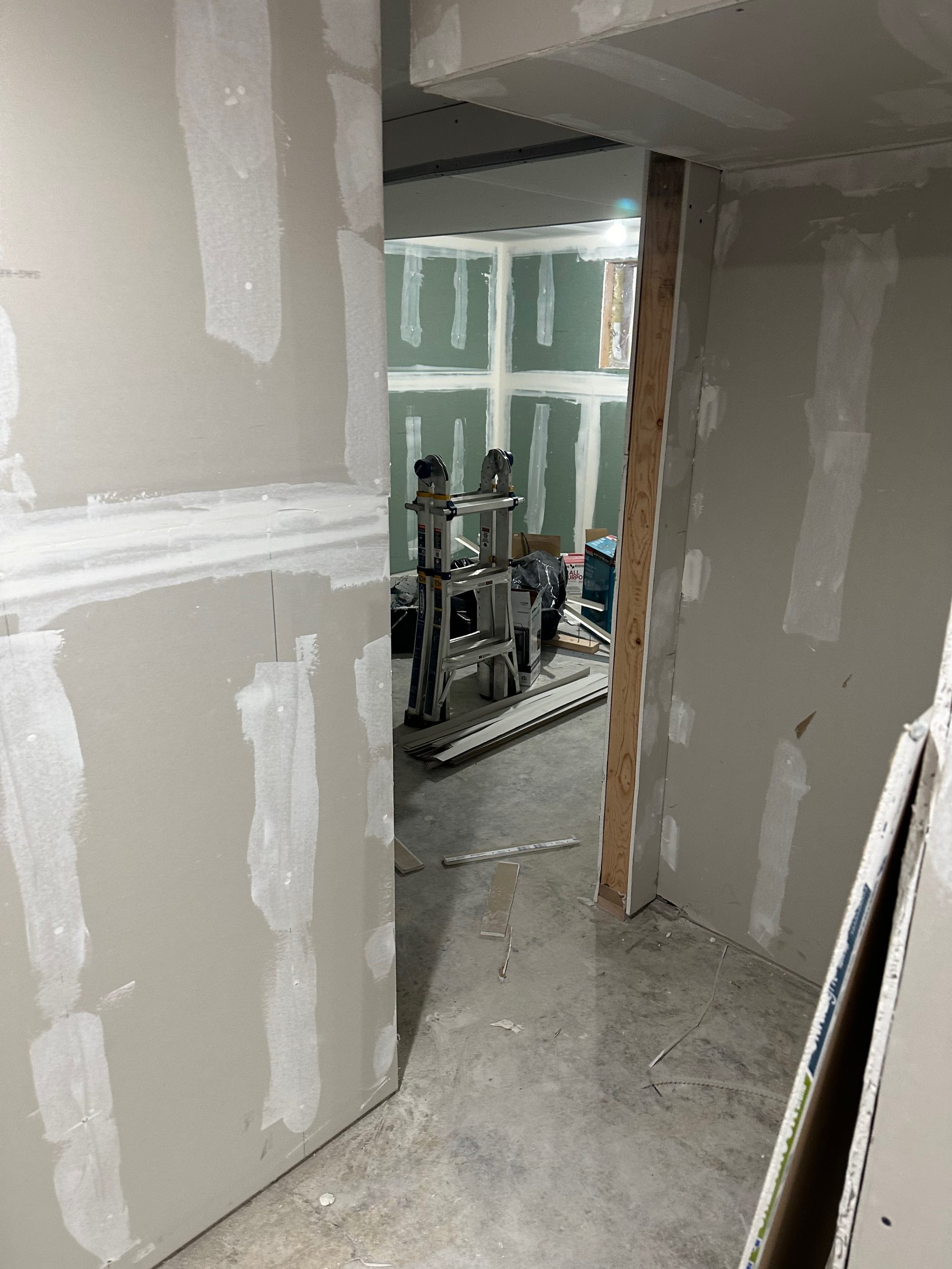 basement conversion process drywall bedroom 1 scaled