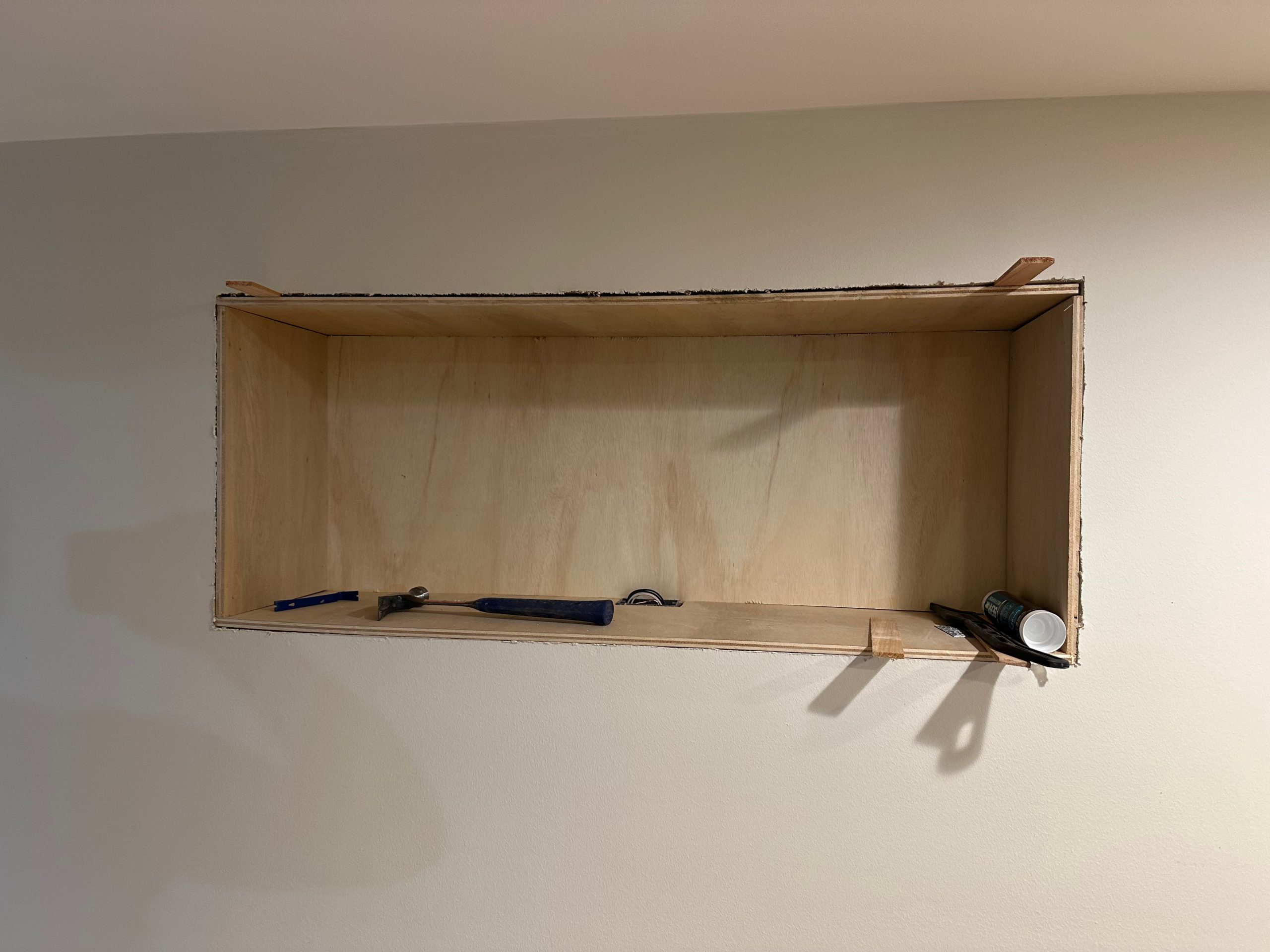 basement conversion process shelf scaled