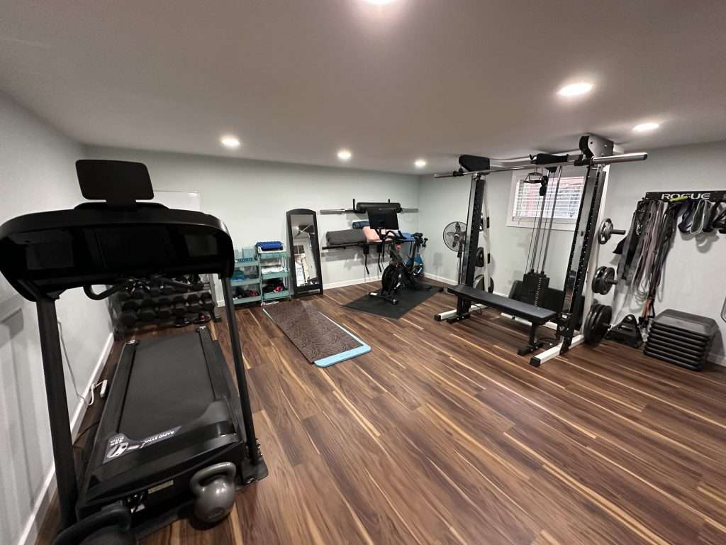 home gym garage conversion open layout showing full equipment zones